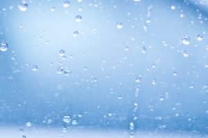 Water droplets on a glass patio door.