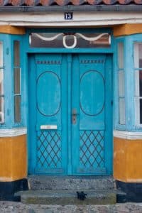 Blue front door with no windows