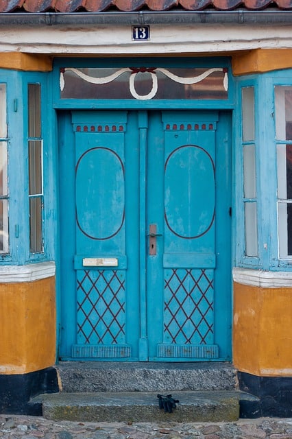 Blue front door with no windows