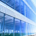 An outside view of a full glass window wall.