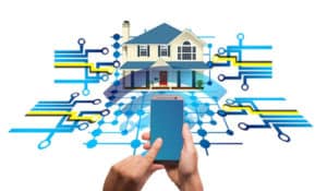 A diagram of a hand holding a smartphone with a clipart image of a home in the background to show a mart home.