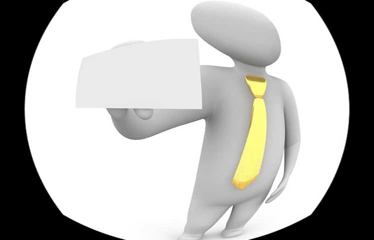 A clipart figure with a long, yellow tie holding up a horizontal piece of blank paper.