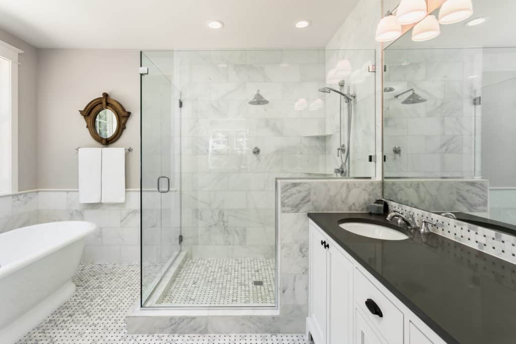Marble shower with glass enclosure Marble shower with glass enclosure