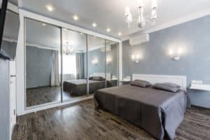 A wall is covered in a bedroom