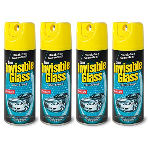 Four Cans of Invisible Glass Spray in a line