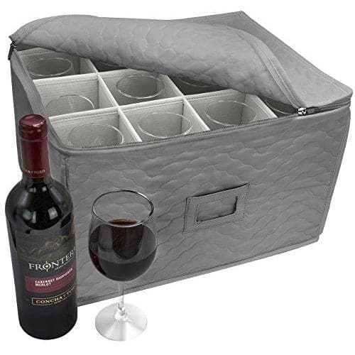 Sorbus Gray Stemware Storage Chest with zipper, sits partly open with wine glasses inside. A Unopened red wine bottle sits on front of the storage chest with a filled wine glass in front of it.