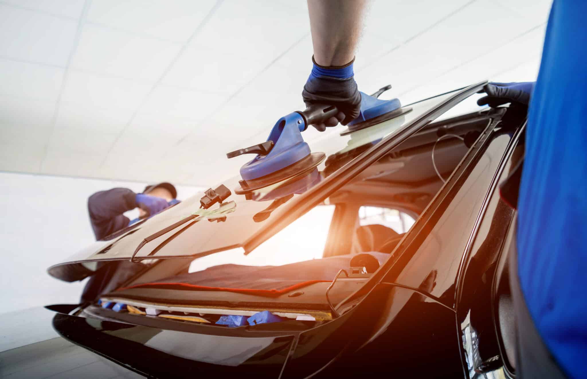Shot of an auto glass installation on the windshield.
